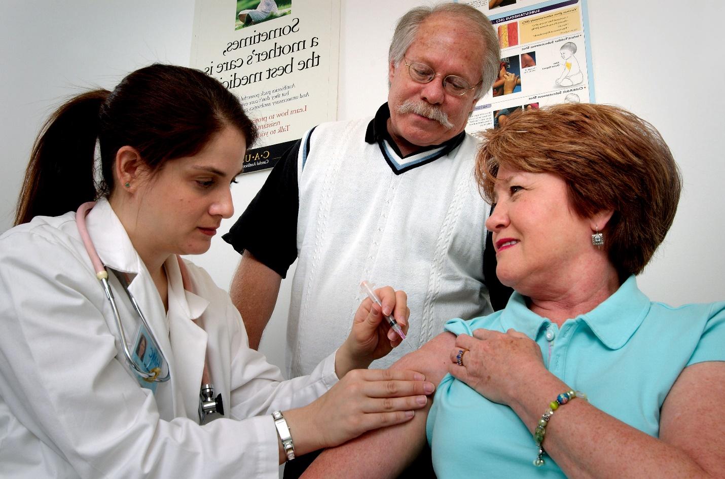 Free picture: middle, aged, woman, receiving, intramuscular, vaccination,  shoulder