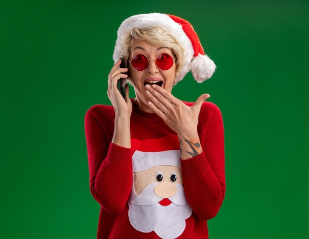 Woman Dressed in Santa Costume Surprised While Talking on The Phone