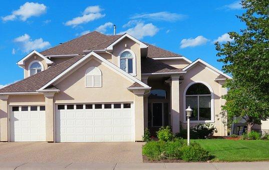 WeServe House With Front Garage Doors