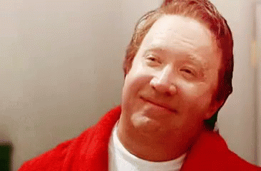 gif of Tim Allen from the Santa Clause transforming into Santa