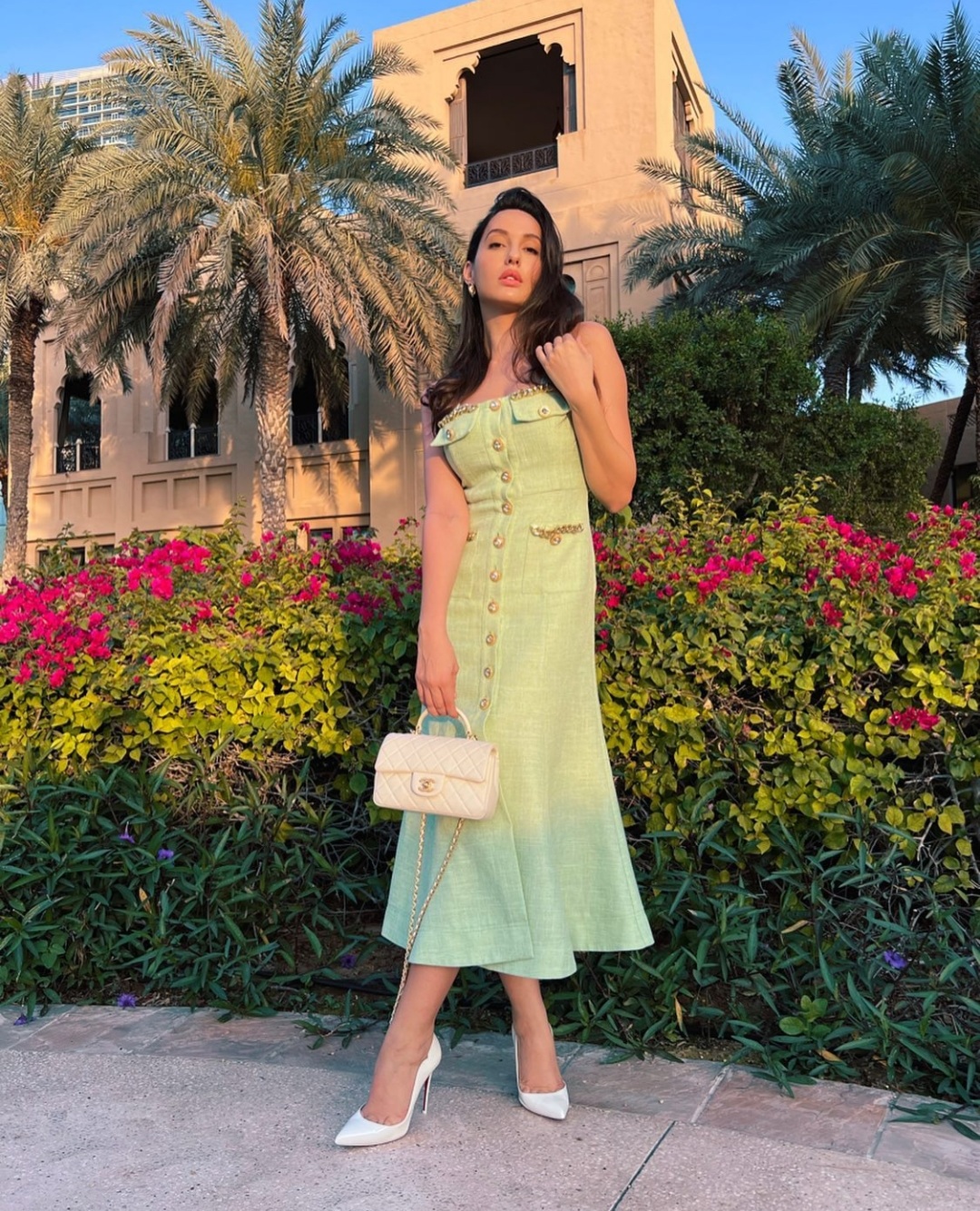 Nora Fatehi travels in style in a mint dress worth $430