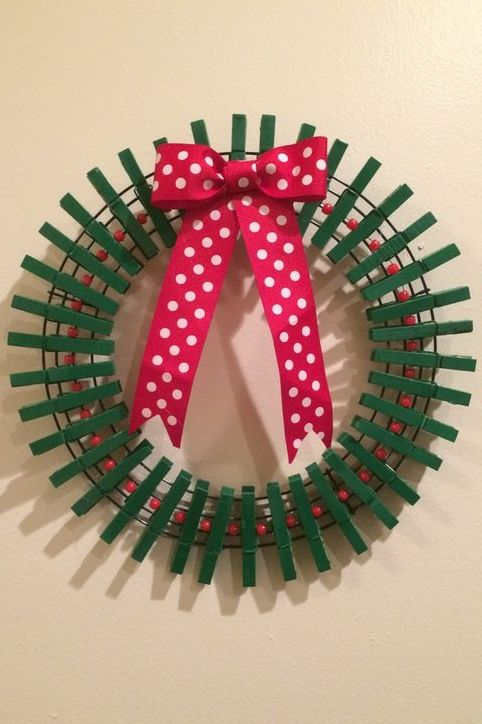Wreath Card Holder: These 25 DIY Christmas Card Holders - That Double As Festive Decor will allow you to beautifuly display your cards and will also give you some great decor. 
