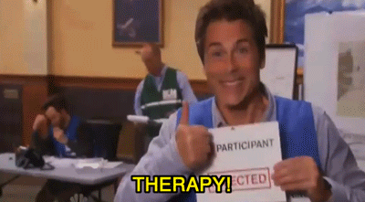 Chris Traiger from Parks and Recreation saying "Therapy!" and giving a thumbs up. 
