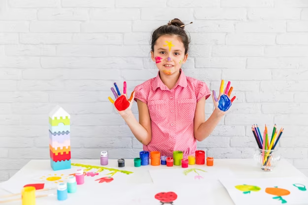 A little girl doing color mixing