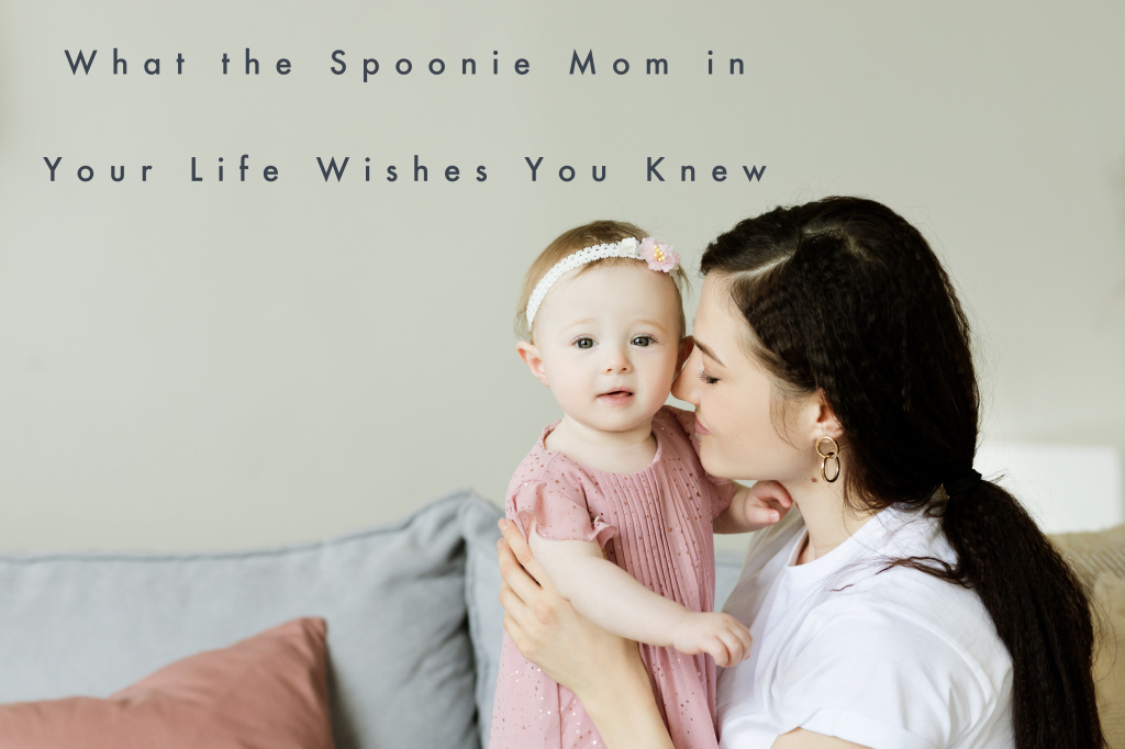 What the Spoonie Mom in Your Life Wishes You Knew - Title floats over a mother cuddling her infant daughter.
