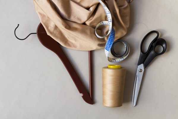 dressmaker-workspace-with-tools-hanger