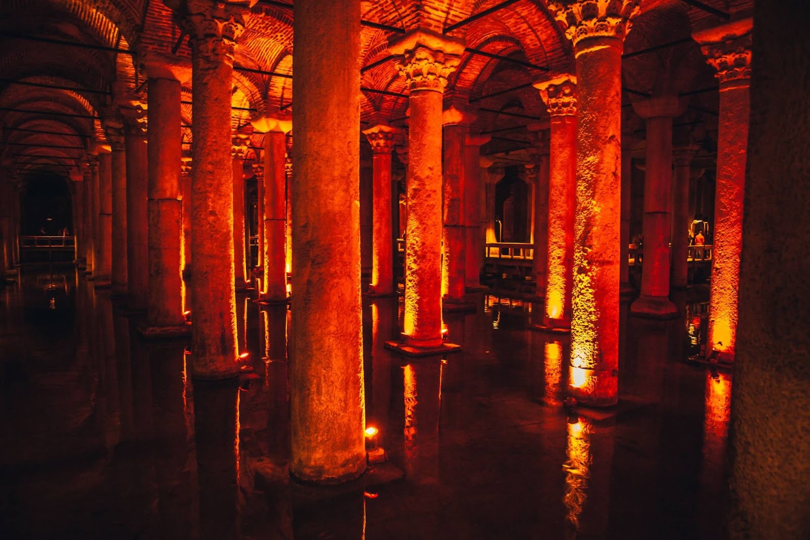 2 days in Istanbul itinerary, the interiors of Basilica Cistern with its pathways illuminated with red and green lights