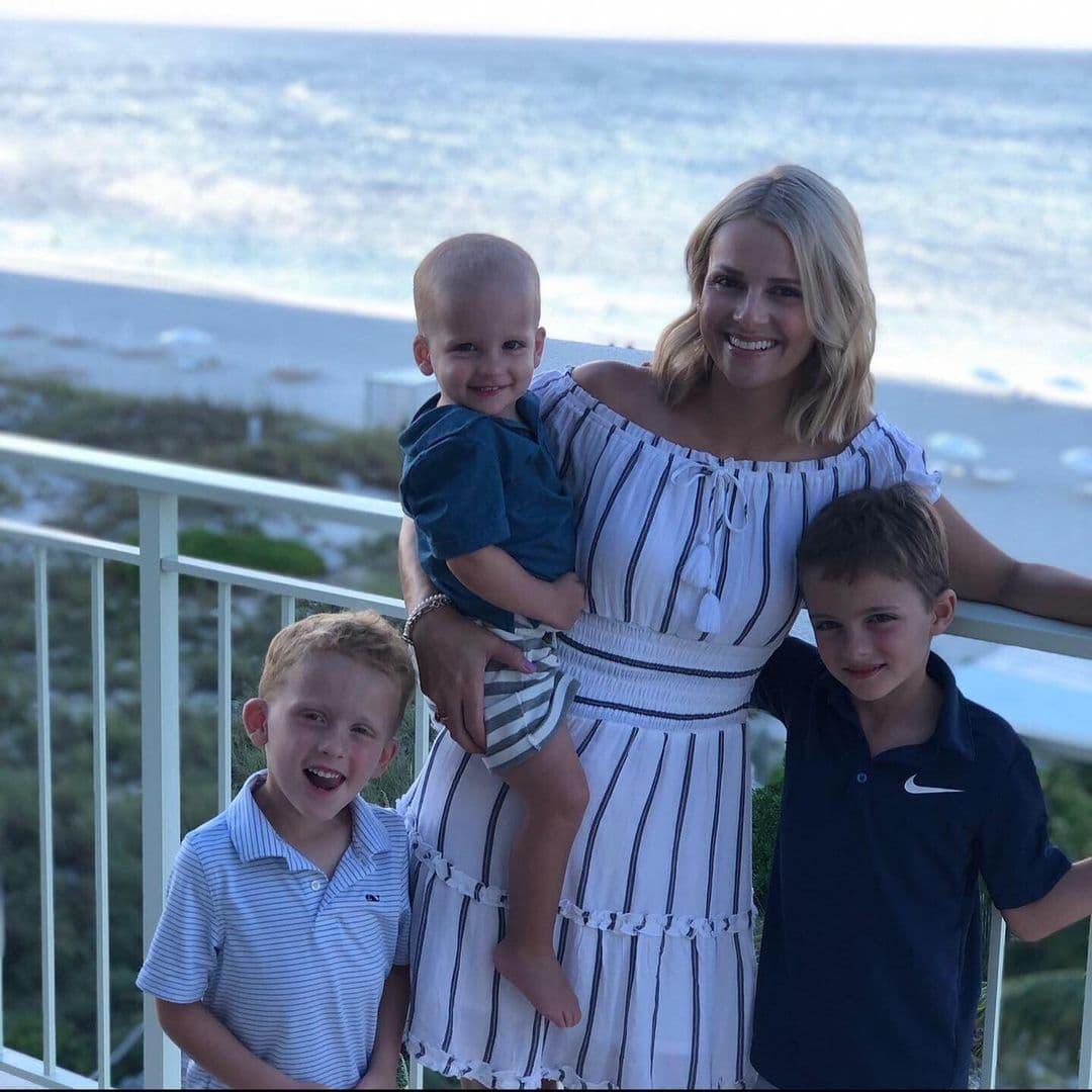 Chris Kirk’s wife with their children