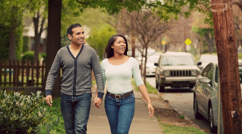 couple walking through neighborhood