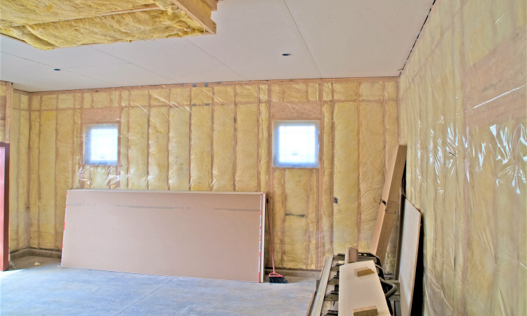 An insulated garage before the drywall has been installed