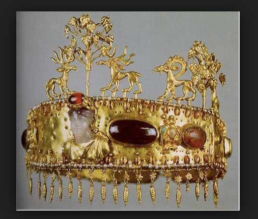 Gold diadem with precious jewels at Condren Galleries.