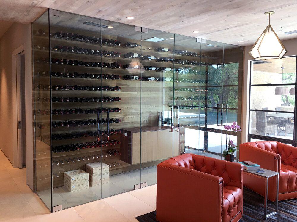 A wine room with glass walls