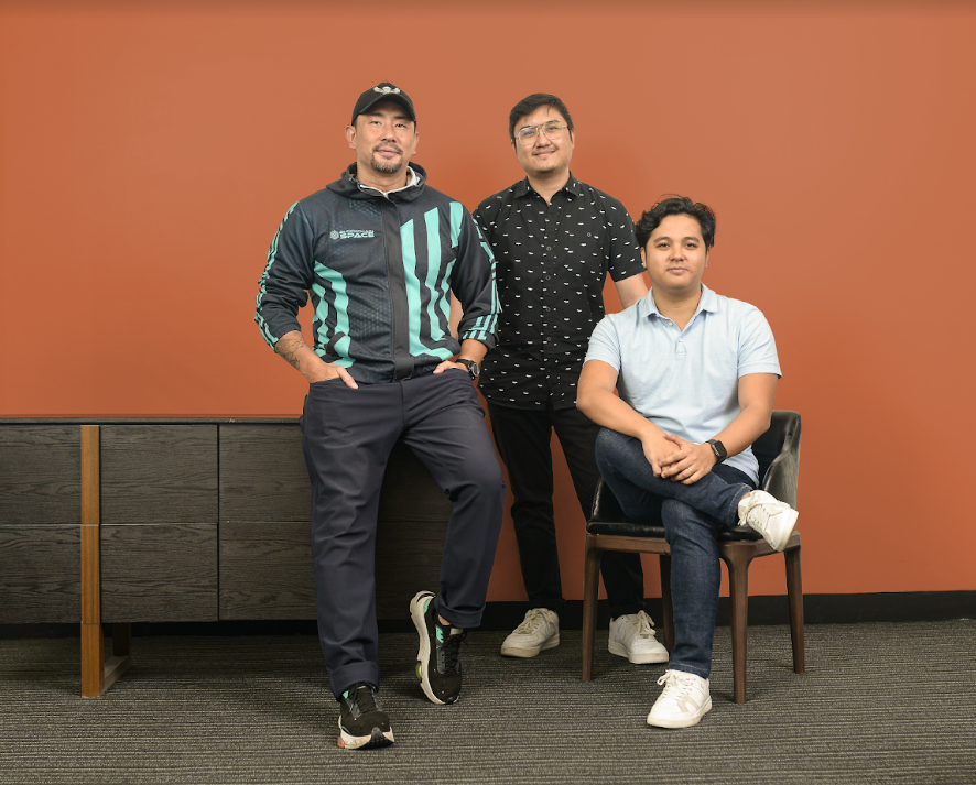 CEOs of Metasports and BlockchainSpace pose in a photo with Lars Hernandez at the center