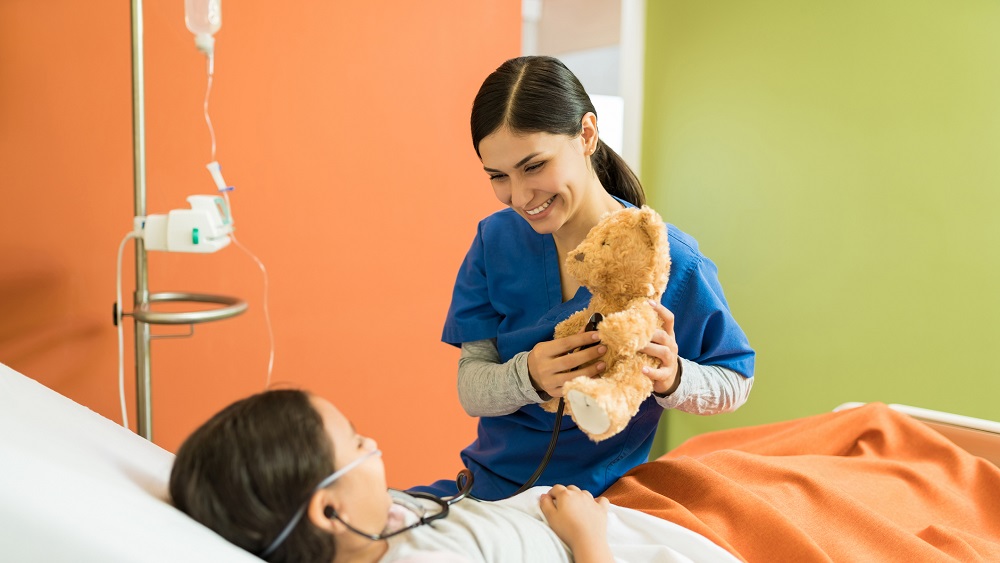 A pediatric nurse caring for a child 