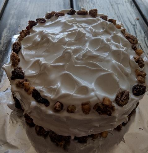 A cake with white frosting

Description automatically generated with low confidence