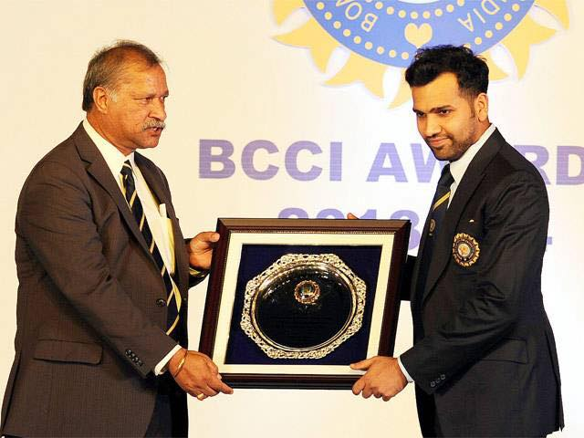 Rohit Sharma receiving award for scoring a world record ODI score of 264 