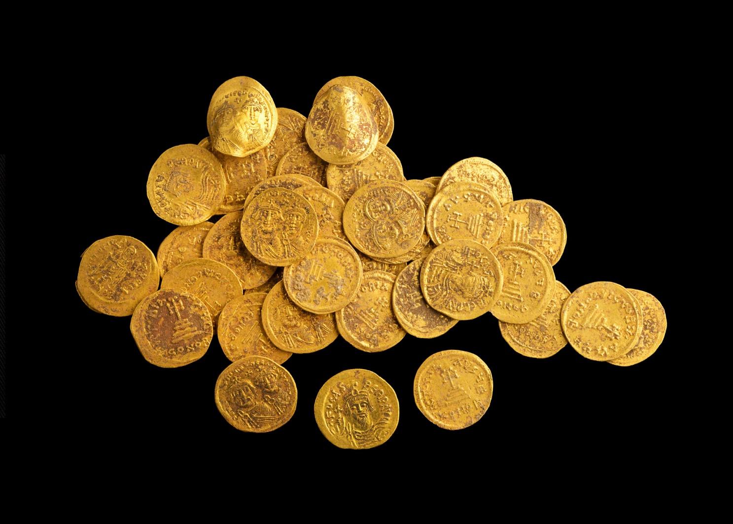 Dozens of pure gold coins discovered in secret cache dating from Muslim  conquest | The Times of Israel