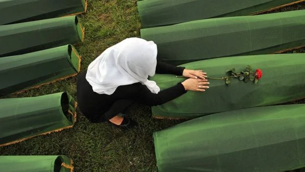 A picture taken on July 10, 2013 shows a Bosnian Muslim woman, survivor of Srebrenica 1995 massacre,