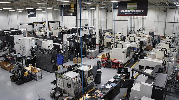 Inside of a machine shop with multiple CNC machines