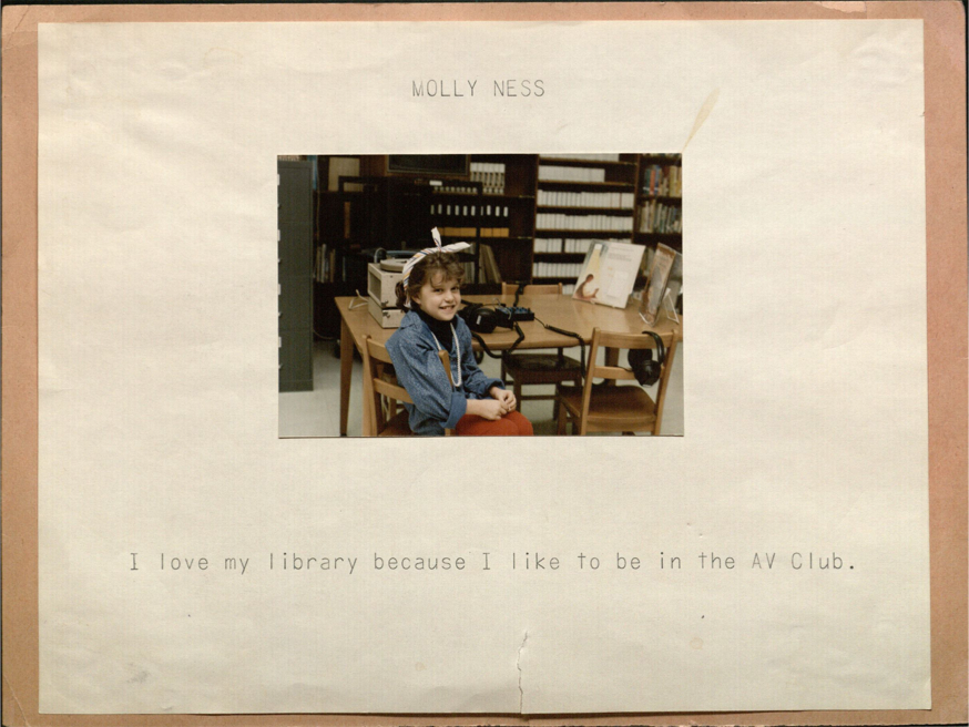 Dr. Molly Ness as a child in her school library.