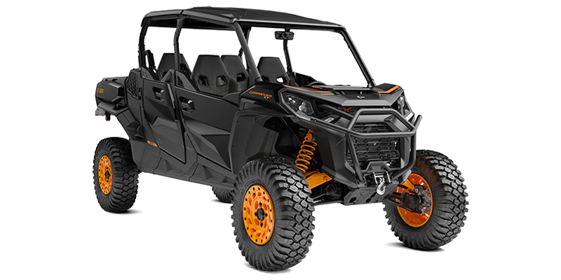 Black and orange Can-Am Commander Max 4-seater - the perfect off-road vehicle for thrilling adventures with family and friends.