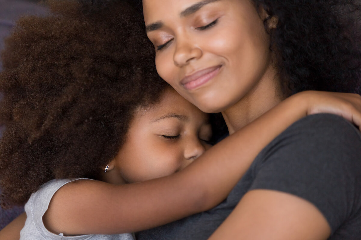 HIPAA privacy: mother and daughter hugging each other
