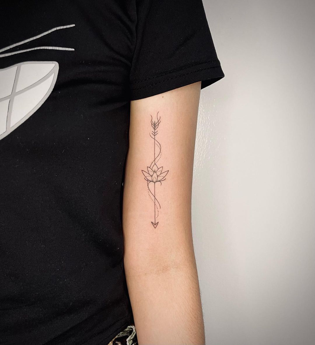 lotus arrow tattoo