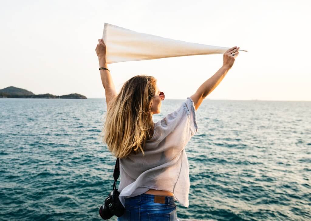 girl waving a white flag