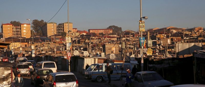 FILE PHOTO: Alexandra Township, an informal settlement for thousands of South Africans who lack the means to get a proper home, South Africa,  July 28, 2016. REUTERS/Siphiwe Sibeko/File Photo