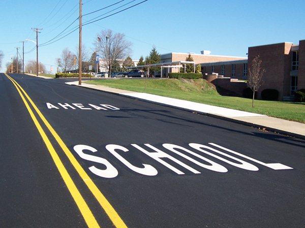 Reflective heat paint for roads