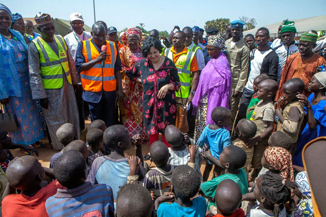 Special Representative of the Secretary-General for Children and Armed Conflict Leila Zerrougui (centre), meets displaced children and their families in northeastern Nigeria, in January 2015. Credit: UN