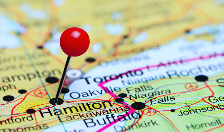 A map of the Toronto area with a red pin stuck in “Hamilton.”