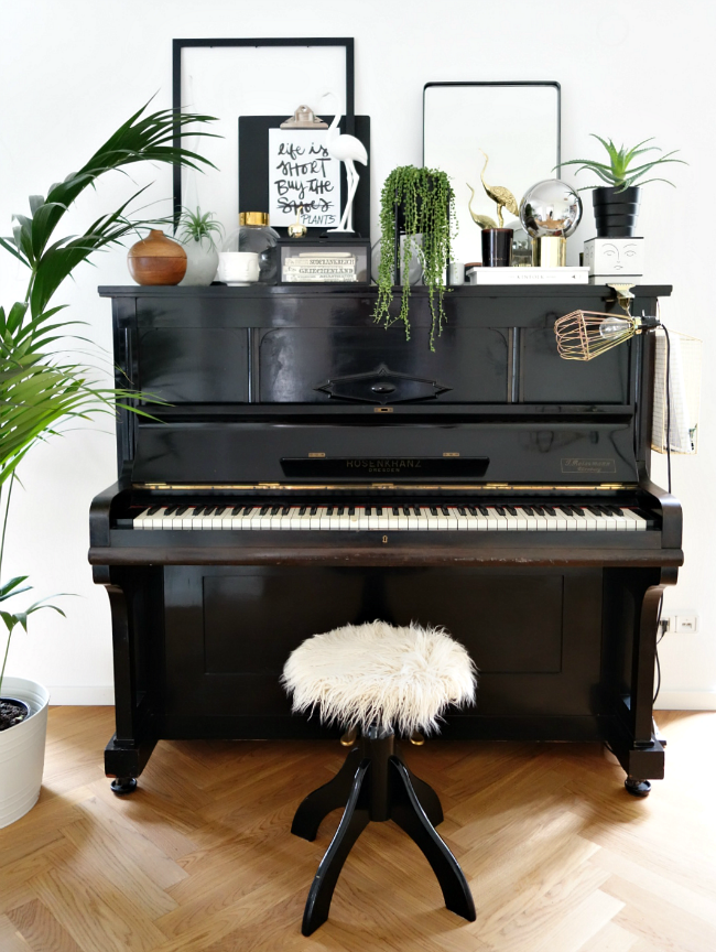 piano with plant decor