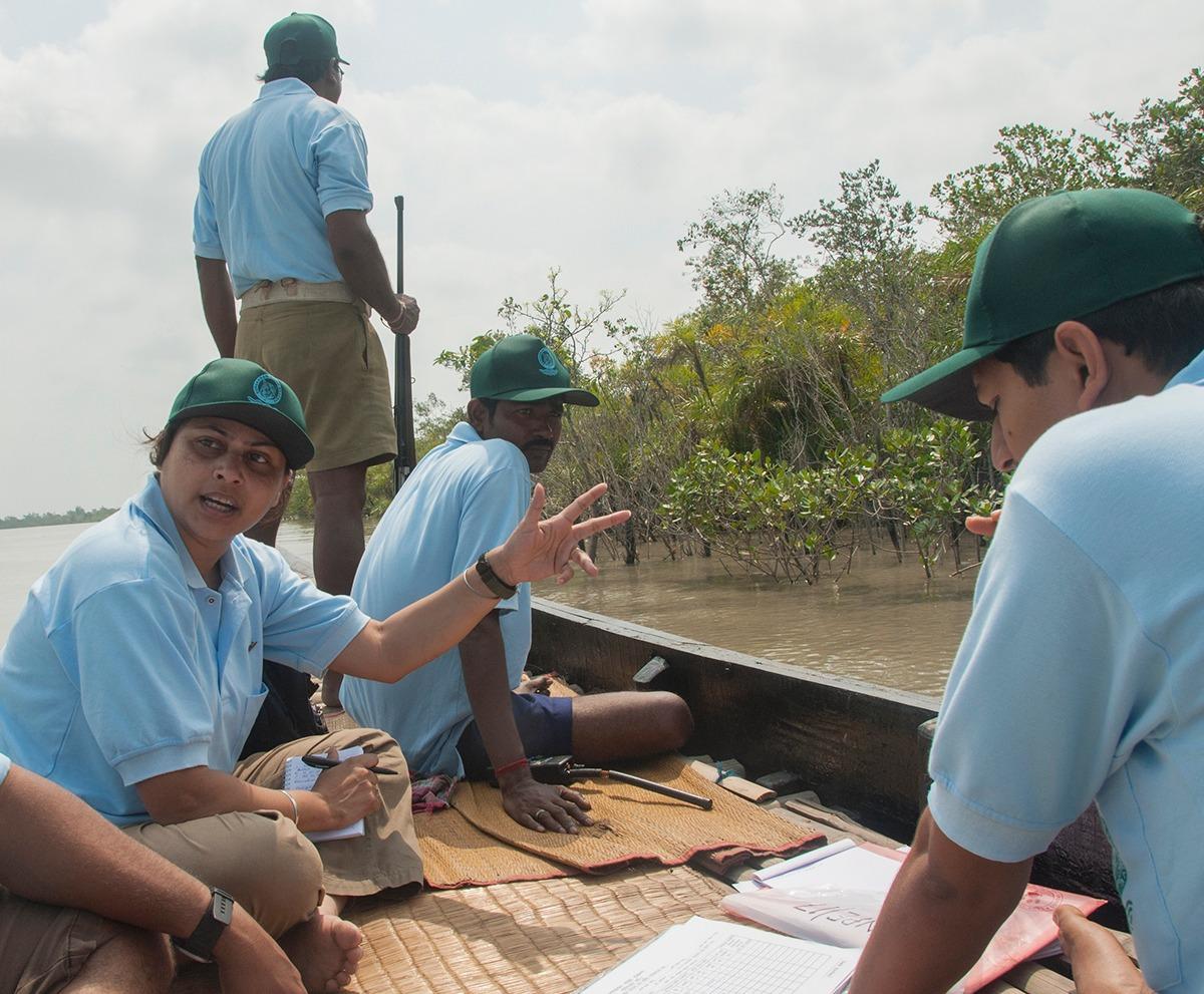 A group of men working on a construction site

Description automatically generated with low confidence