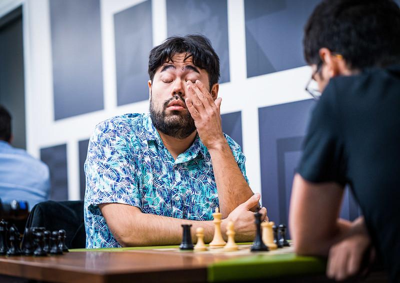 chess24.com on X: Alireza Firouzja shakes his head and mutters to himself  as he realises he went astray in the first game. Magnus Carlsen and Hikaru  Nakamura (vs. Giri) opened with wins!