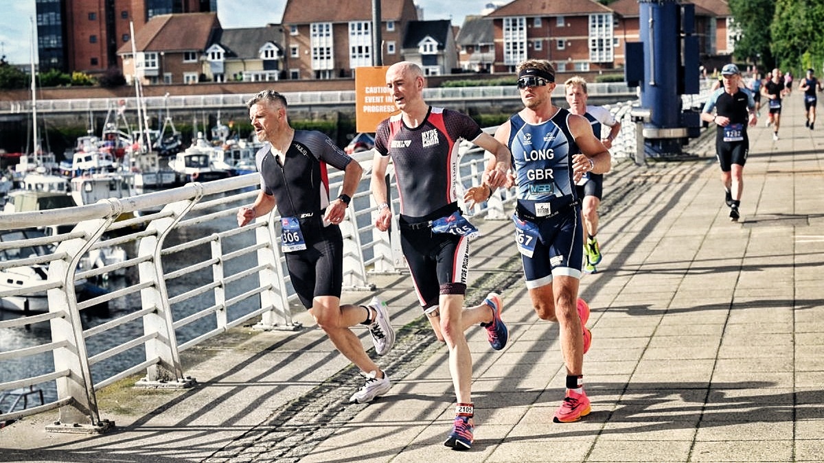 A good posse of us running allong the marina