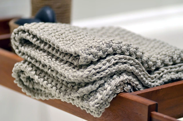gray cotton knit rug folded