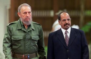 Cuban President Fidel Castro (L) walks with President of the Democratic Arab Republic of Sahara (Western Sahara) and Secretary General of the Polisario Front, Mohamed Abdelaziz during arrival ceremonies 22 January, 2002 in Havana.  Abdelaziz is on a five-day visit to Cuba at the invitation of Castro.         AFP PHOTO/Adalberto ROQUE        (Photo credit should read ADALBERTO ROQUE/AFP/Getty Images)