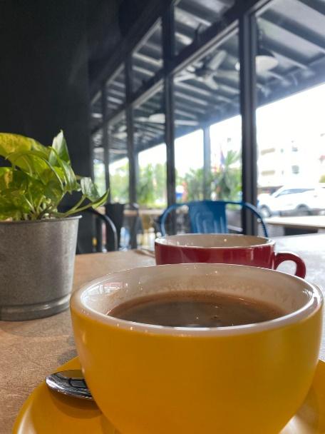 A picture containing cup, table, coffee, food

Description automatically generated