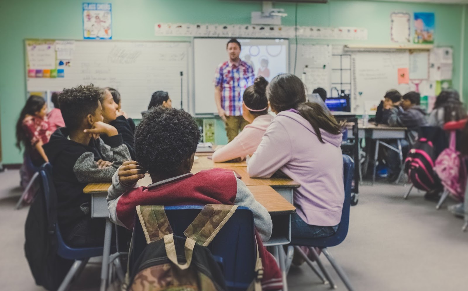 A group of students sitting in a storytelling class