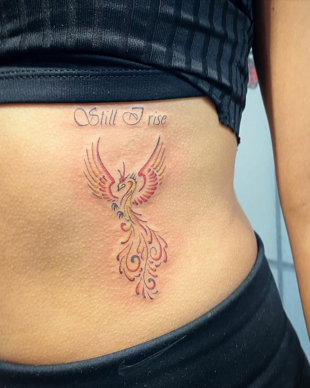 Phoenix And Lettering Tattoo