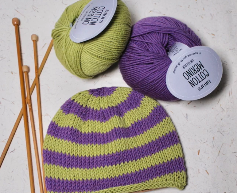 purple and green stipe hat