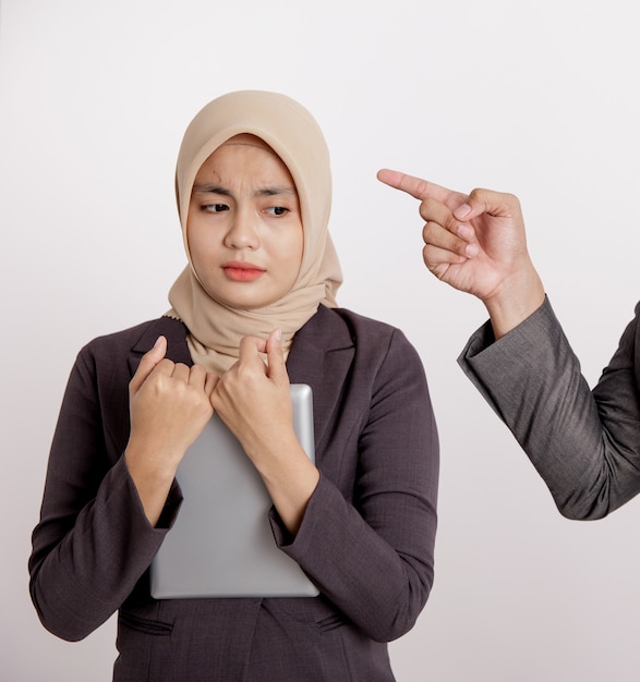 Hand pointing angrily with the female staff for making a mistake. concept of work office isolated white background