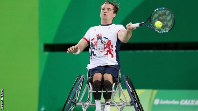Gordon Reid of Great Britain returns a shot at the Men's Singles Wheelchair Tennis gold medal match at the Rio Paralympic Games
