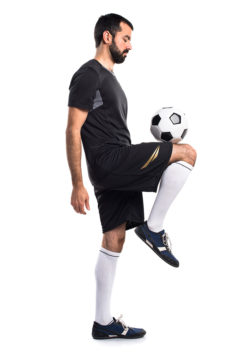Juggling a soccer ball with ball on knee