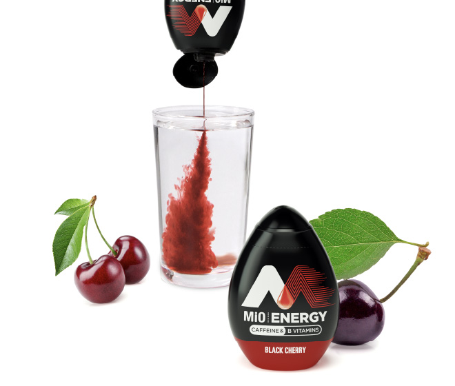 MiO energy water enhancer with cherries in the background.