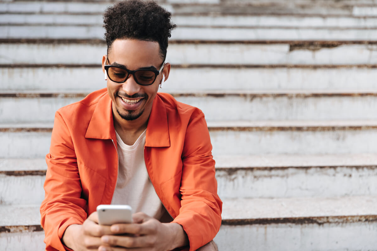 Mental health outcomes: man using his phone