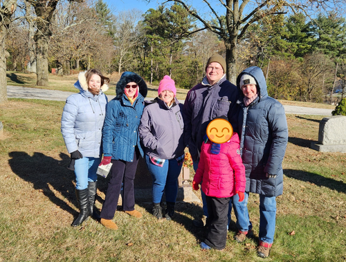 members of the Keller-Brown Insurance Services team together at a cemetery in Glen Rock for Wreaths Across America