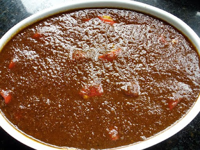 The assembled, sauced dish ready for baking