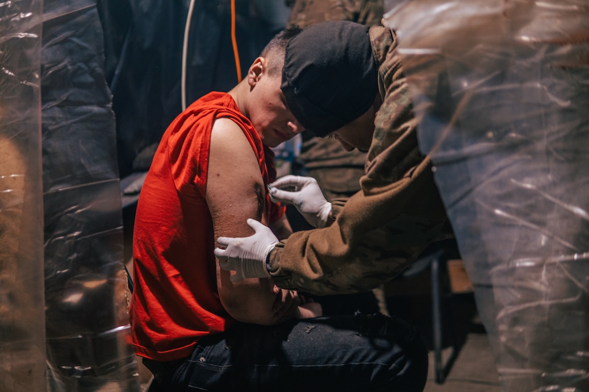 Ukrainian Soldier Getting Wound Treated Under Mariupol Steel Factory
